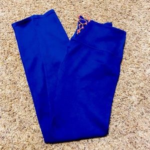 Royal blue Athleta ribbed leggings with coral elastic back. Size 6.